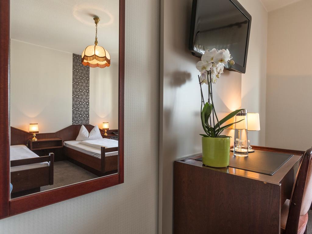 Hotel Garni Geisler Colonia Habitación foto